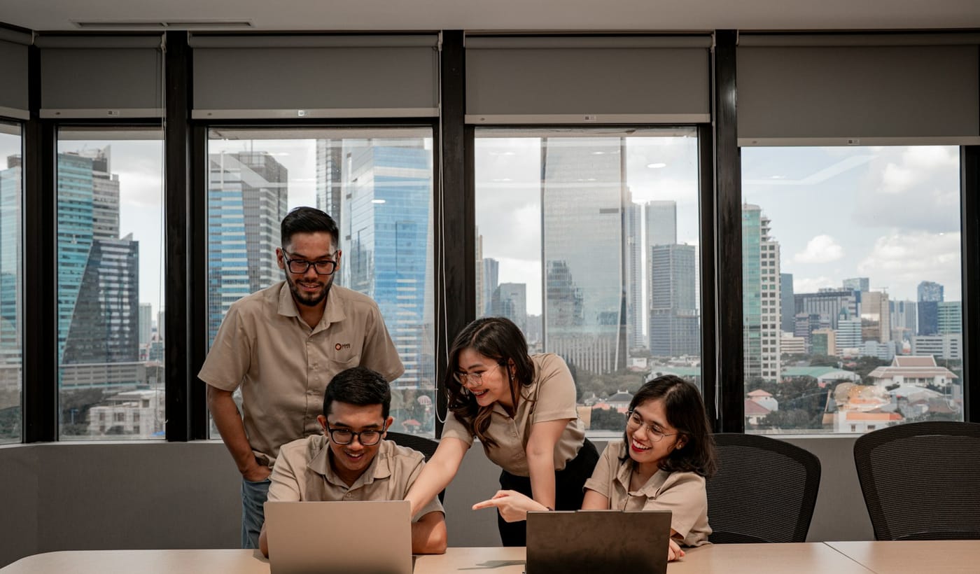 Business team collaborating with technology